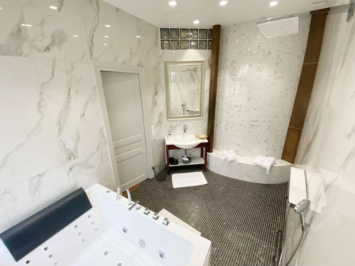 Le Clovis Suites Spa Sauna Reims Bagian luar foto
