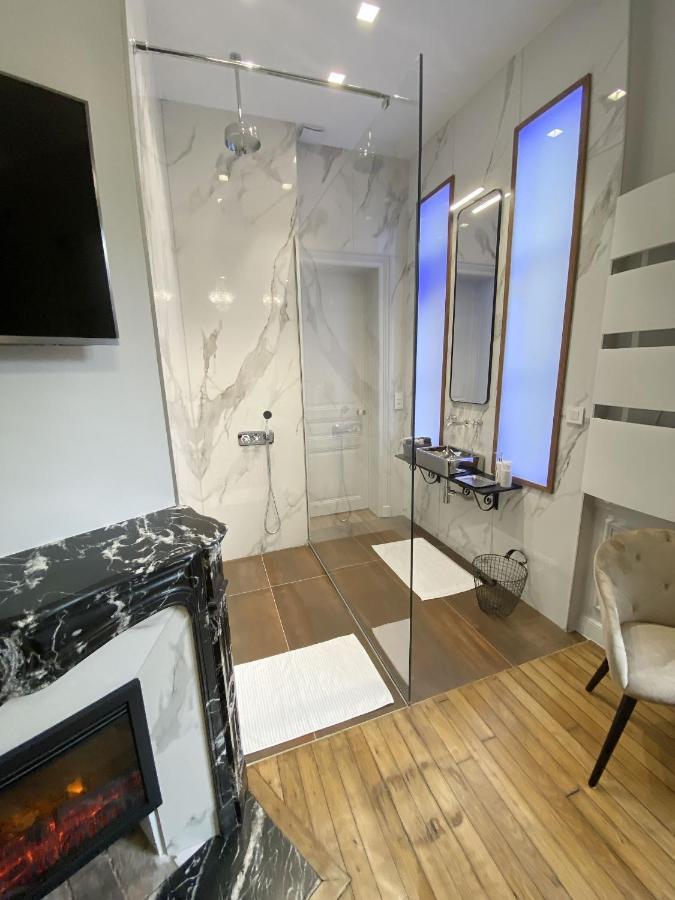 Le Clovis Suites Spa Sauna Reims Bagian luar foto