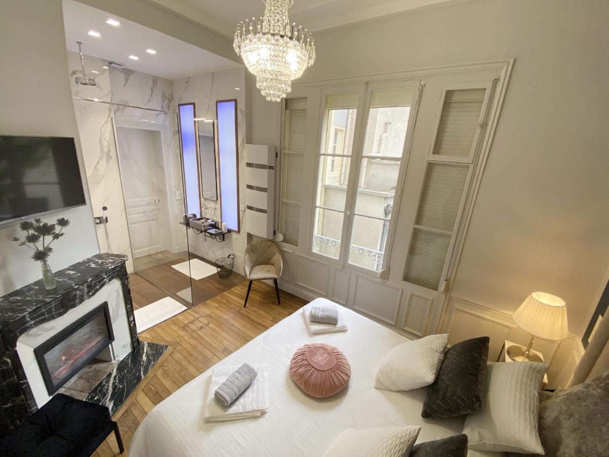 Le Clovis Suites Spa Sauna Reims Bagian luar foto