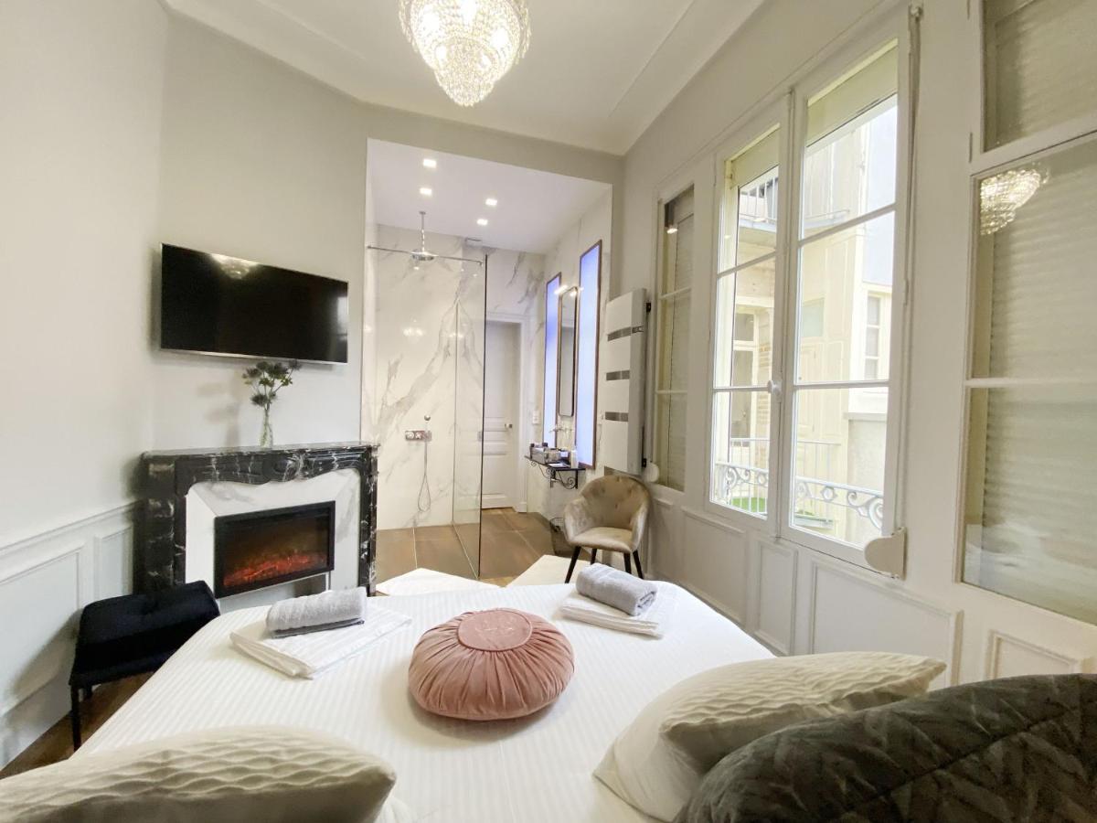 Le Clovis Suites Spa Sauna Reims Bagian luar foto